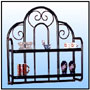 Wall Mounted Utility Rack         A catchy wall mounted rack inlayed with cold wrought scrolls. Complete with edged glass shelves.  Sizes: H : 24"  Rack size : 23.5" x 8"  WT : 11 lbs (Without Glass)  Frame work in 3/4" Round Tubing & 3/8" Round Stock.  Scrolls in 5/16" Sq. Solid Stock.