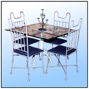 Chair     Sizes: B.H : 42"  S.H : 17"   S. Size : 16" x 15"  WT : 31 lbs   A blend of 1/2" Round Stock in basic frame work.   Motif & filling in 1/2" Premium Grade Round Tubing.  Chair brasses; Solid Stock 3/8" with matching forged reef knots.     Table   Sizes: H : 29"  Top Size : 29" x 29" WT : 33 lbs (Without Glass) Sizes: H : 29"  Top Size : 29" x 29" WT : 33 lbs (Without Glass)      A blend of Heavy gauge Round 11/8" dia.    Base Stems in Carbon Steel machined Sections.  Bracing; hot worked 1/2" Round knotted & Twisted forging.      