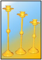 High Class Machined Candle Stands     "Aestheta" range - heavy alloy.   Sizes: H : 18.25"  W : 4.25"  WT : 4 lbs     Deep Serated; Moulded Machined base 4.25" dia.    1/2" Round Stock with Solid Machined Knot.    Light alloy moulded; machined plate & lily with spike     Set of three in Similar Composition.     
