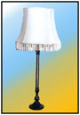 Table Lamp    A specially designed cross brushed fine textured stainless steel lamp with a lot of black trim and medium sized heavy base. One out of "Stella" selection.    Sizes: H : 26"  B.W : 5.75" dia  WT : 9 lbs     Bulbous deep profiled 7.5" dia. Heavy alloy Moulded base.    Scratch Premium Quality Polymer Coated Stainless Steel Stem with Dowell.