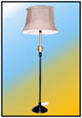 Pedestal Lamp     Another thematic composition from the "Gildo" range of lamps. A customized unit with matt black stem; base and eye level scratched brass.    Sizes: H : 56"  W : 9.5"  WT : 22 lbs (Without Shade) 